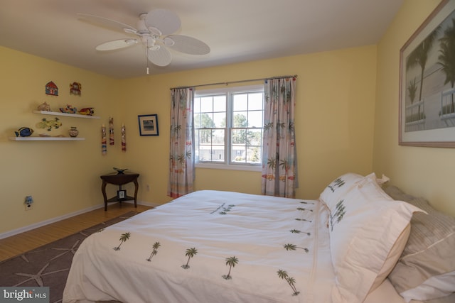 65 White Bark Dr, Middletown, DE 19709 - bedroom with wood finished floors, a ceiling fan, and baseboards
