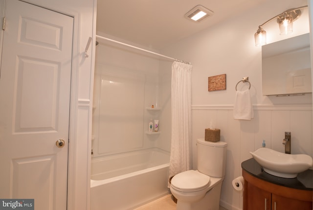 65 White Bark Dr, Middletown, DE 19709 - full bath featuring shower / bathtub combination with curtain, toilet, vanity, and wainscoting