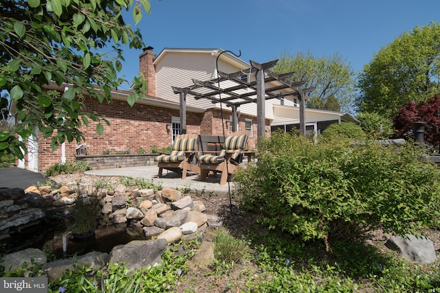 65 White Bark Dr, Middletown, DE 19709 - view of yard featuring a pergola and a patio