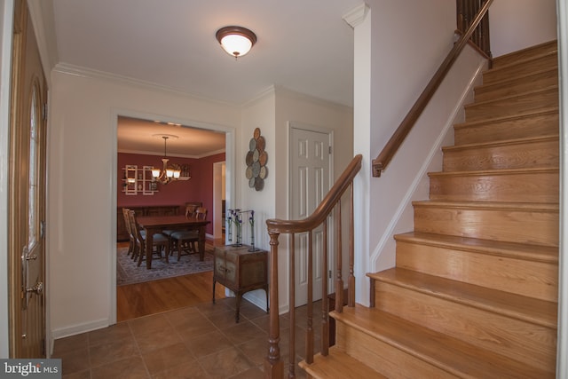 65 White Bark Dr, Middletown, DE 19709 - foyer entrance featuring stairs, crown molding, and a chandelier