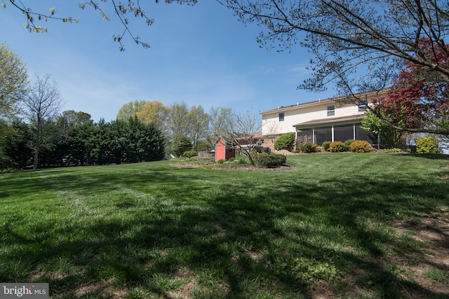 65 White Bark Dr, Middletown, DE 19709 - view of green lawn featuring a sunroom