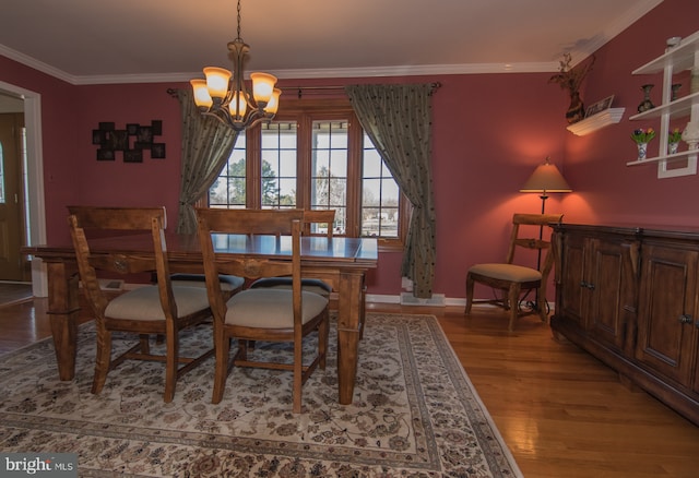 65 White Bark Dr, Middletown, DE 19709 - dining space featuring a chandelier, wood finished floors, ornamental molding, and baseboards