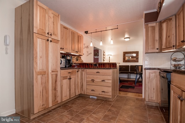 65 White Bark Dr, Middletown, DE 19709 - kitchen featuring light brown cabinets, dark countertops, dishwasher, decorative backsplash, and a textured ceiling