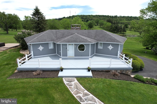 108 Wright St SE, Frostburg, MD 21532 - ranch-style home featuring a porch, a shingled roof, and a front lawn