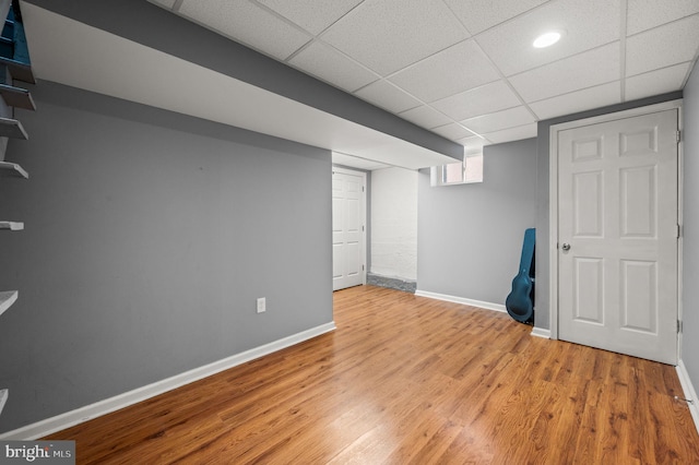 602 Braxton Rd, Ridley Park, PA 19078 - basement featuring baseboards, wood finished floors, and a paneled ceiling