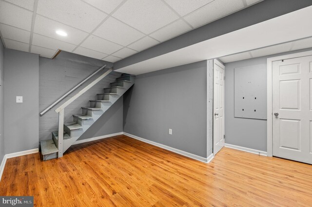 602 Braxton Rd, Ridley Park, PA 19078 - finished basement featuring baseboards, a drop ceiling, light wood finished floors, and stairs