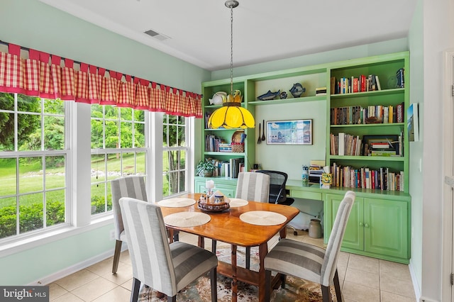 8145 Cyprus Cedar Ln Unit C, Ellicott City, MD 21043 - dining space featuring plenty of natural light, light tile patterned floors, and baseboards