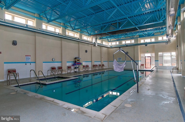 8145 Cyprus Cedar Ln Unit C, Ellicott City, MD 21043 - view of swimming pool featuring an in-ground hot tub