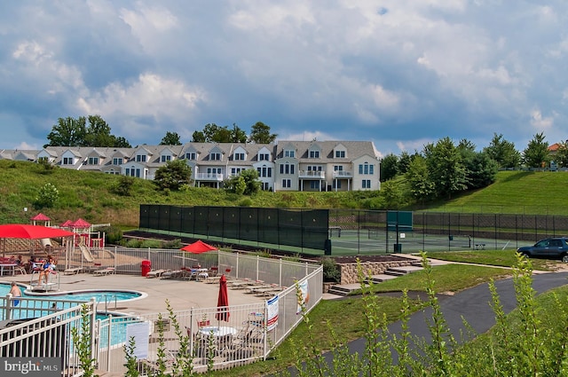 8145 Cyprus Cedar Ln Unit C, Ellicott City, MD 21043 - surrounding community featuring a pool and a patio area