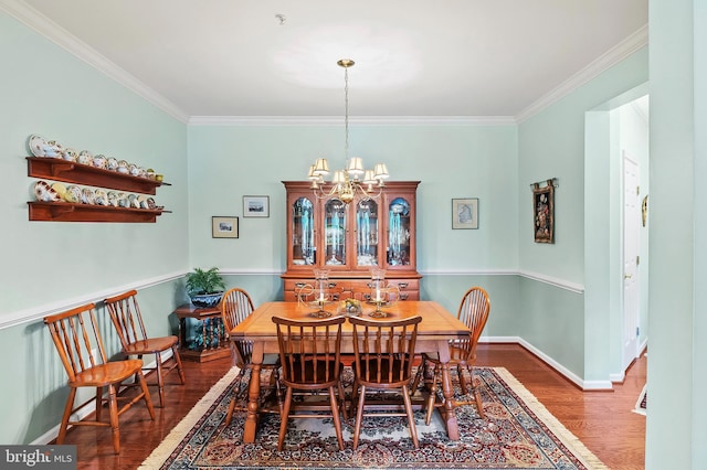 8145 Cyprus Cedar Ln Unit C, Ellicott City, MD 21043 - dining room featuring wood finished floors, ornamental molding, a chandelier, and baseboards