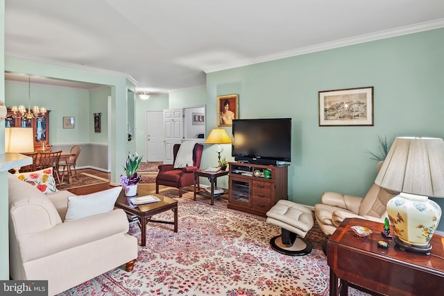 8145 Cyprus Cedar Ln Unit C, Ellicott City, MD 21043 - living area with ornamental molding, a chandelier, and wood finished floors
