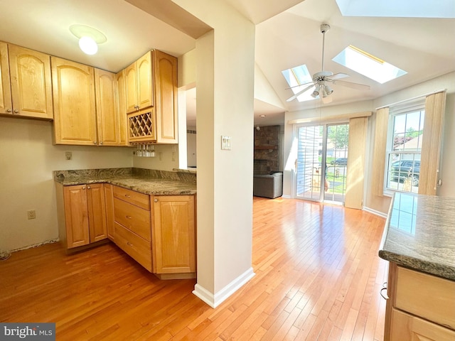 55 W Windrose Dr, Richboro, PA 18954 - kitchen with a skylight, light wood finished floors, lofted ceiling, open floor plan, and a ceiling fan