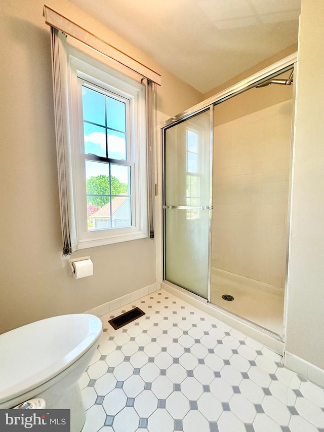 55 W Windrose Dr, Richboro, PA 18954 - full bath with a stall shower, tile patterned floors, baseboards, and toilet