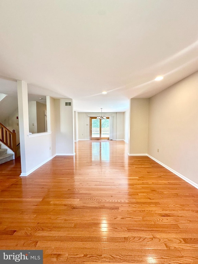 55 W Windrose Dr, Richboro, PA 18954 - unfurnished living room with light wood-style flooring, stairway, and baseboards