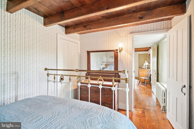 1132 Upper Stump Rd, Chalfont, PA 18914 - bedroom featuring wallpapered walls, hardwood / wood-style floors, radiator, and wood ceiling with exposed beams