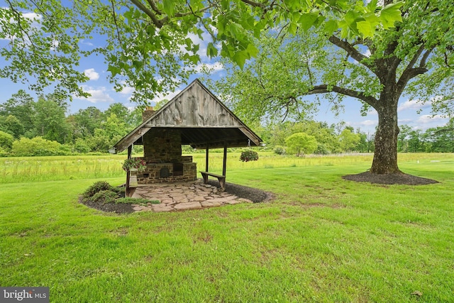 1132 Upper Stump Rd, Chalfont, PA 18914 - view of green lawn with an outdoor fireplace