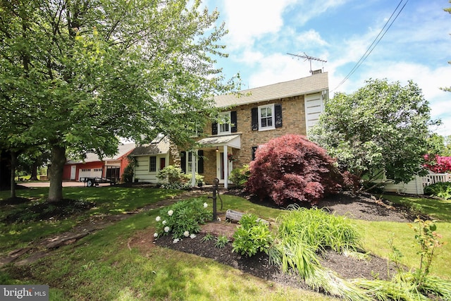 1132 Upper Stump Rd, Chalfont, PA 18914 - view of front of home with stone siding, a front lawn, and an attached garage