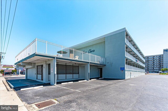 3010 Philadelphia Ave Unit S106, Ocean City, MD 21842 - view of building exterior with uncovered parking