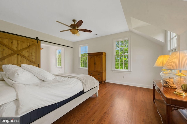 1293 Eagle Rd, New Hope, PA 18938 - bedroom featuring wood finished floors, baseboards, a ceiling fan, and a barn door