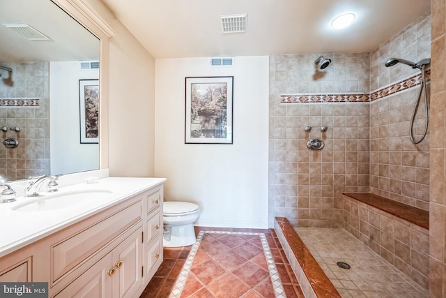 1293 Eagle Rd, New Hope, PA 18938 - bathroom featuring tile patterned floors, vanity, toilet, and a tile shower