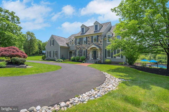1293 Eagle Rd, New Hope, PA 18938 - view of front of house featuring stone siding and a front lawn
