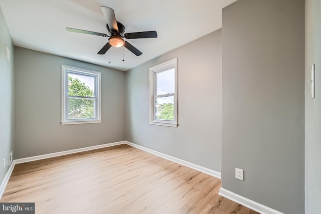 1235 Delbert, Baltimore, MD 21222 - spare room with baseboards, light wood-style flooring, and ceiling fan
