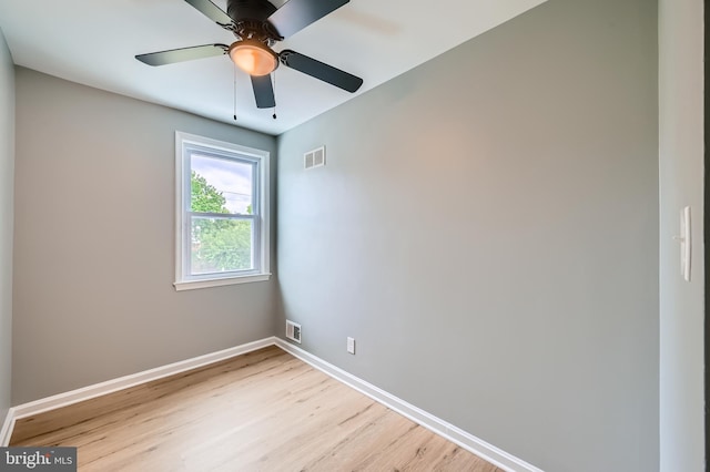 1235 Delbert, Baltimore, MD 21222 - unfurnished room with light wood-style floors, baseboards, and ceiling fan