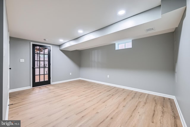 1235 Delbert, Baltimore, MD 21222 - below grade area with wood finished floors, baseboards, and recessed lighting