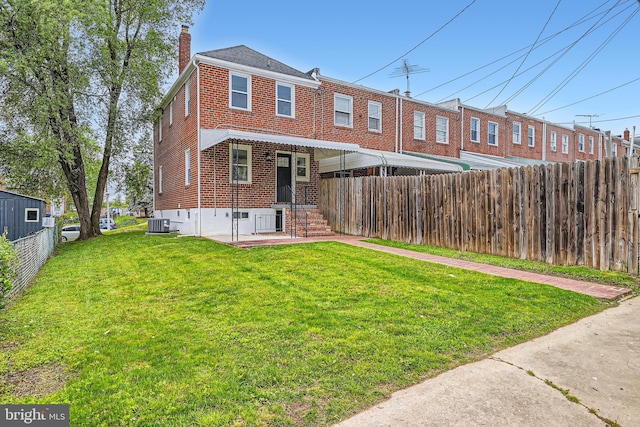 1235 Delbert, Baltimore, MD 21222 - multi unit property with brick siding, a chimney, and central AC unit