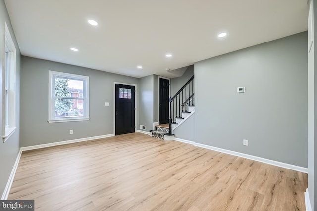 1235 Delbert, Baltimore, MD 21222 - foyer entrance with light wood finished floors, stairway, recessed lighting, and baseboards