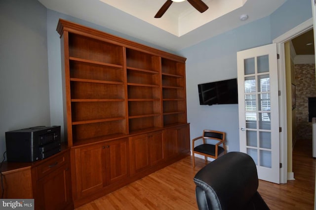 35517 Bonaire Dr, Rehoboth Beach, DE 19971 - office area with light wood-type flooring and ceiling fan