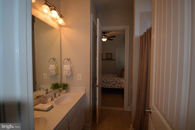 35517 Bonaire Dr, Rehoboth Beach, DE 19971 - full bath featuring double vanity, tile patterned flooring, and ceiling fan