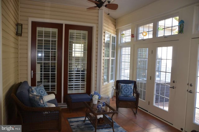 35517 Bonaire Dr, Rehoboth Beach, DE 19971 - sunroom / solarium with french doors, tile patterned flooring, and wood walls