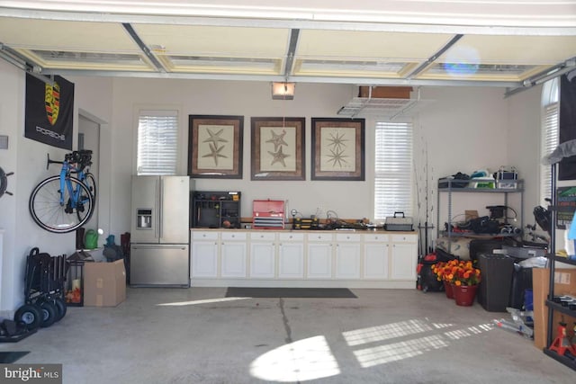 35517 Bonaire Dr, Rehoboth Beach, DE 19971 - garage with stainless steel fridge with ice dispenser
