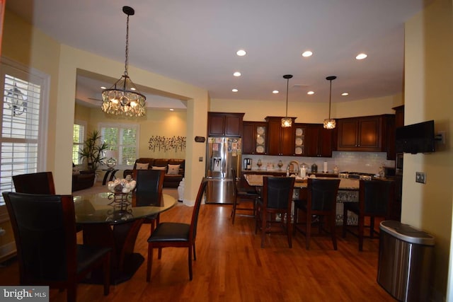 35517 Bonaire Dr, Rehoboth Beach, DE 19971 - dining space with a chandelier, dark wood finished floors, and recessed lighting