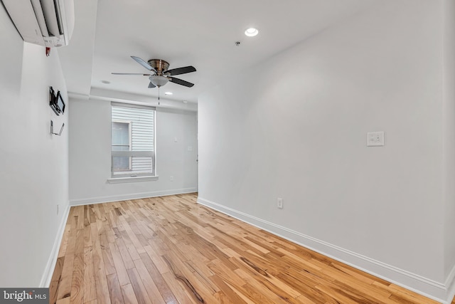 821 N 15th St Unit 2, Philadelphia, PA 19130 - unfurnished room with ceiling fan, light wood finished floors, baseboards, a wall mounted air conditioner, and recessed lighting