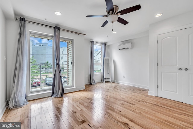 821 N 15th St Unit 2, Philadelphia, PA 19130 - unfurnished bedroom featuring a wall mounted air conditioner, light wood finished floors, baseboards, recessed lighting, and a ceiling fan