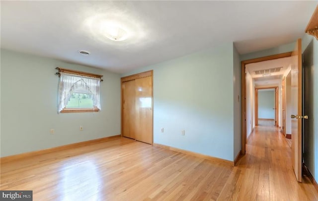 1195 Hemlock St, Palmerton, PA 18071 - unfurnished bedroom featuring light wood finished floors, a closet, and baseboards