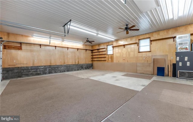 1195 Hemlock St, Palmerton, PA 18071 - garage featuring a ceiling fan and wooden walls