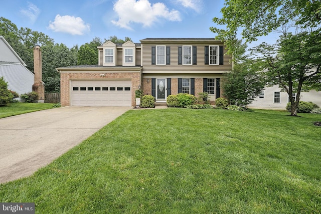 4549 Diehl Ct, Woodbridge, VA 22193 - view of front of house featuring brick siding, driveway, and a front yard