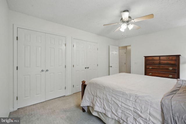 4549 Diehl Ct, Woodbridge, VA 22193 - bedroom with two closets, carpet flooring, and a ceiling fan