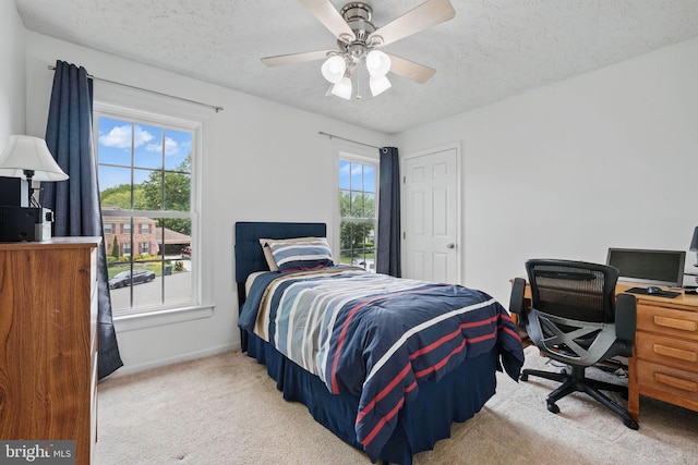4549 Diehl Ct, Woodbridge, VA 22193 - carpeted bedroom with a textured ceiling, baseboards, a desk, and a ceiling fan