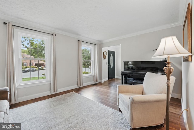 4549 Diehl Ct, Woodbridge, VA 22193 - living room featuring wood finished floors, baseboards, crown molding, and a textured ceiling