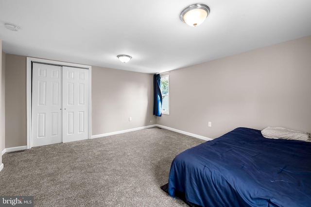 20 Village Rd, Baltimore, MD 21208 - carpeted bedroom featuring baseboards and a closet