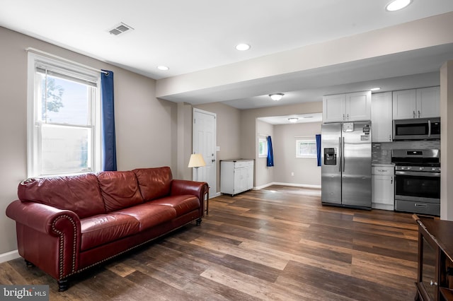 20 Village Rd, Baltimore, MD 21208 - living area featuring dark wood-style floors and recessed lighting