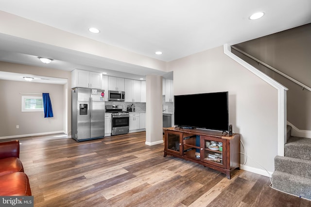 20 Village Rd, Baltimore, MD 21208 - living room with stairs, dark wood-style flooring, and recessed lighting