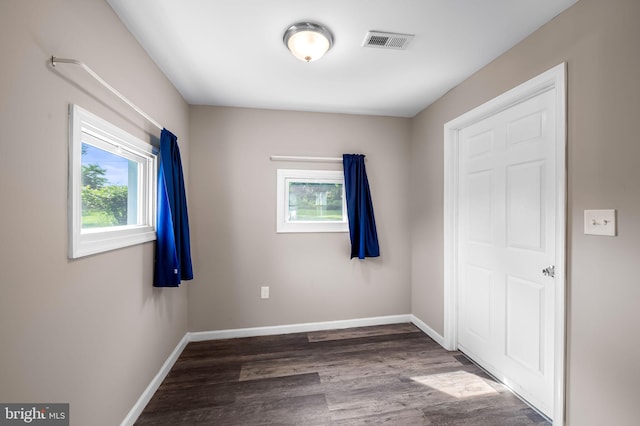 20 Village Rd, Baltimore, MD 21208 - unfurnished room with wood finished floors and baseboards
