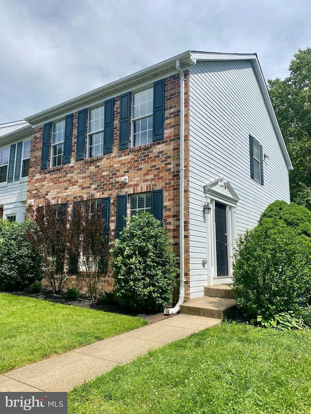 321 Quilting Way, Bel Air, MD 21015 - multi unit property featuring a front yard and brick siding