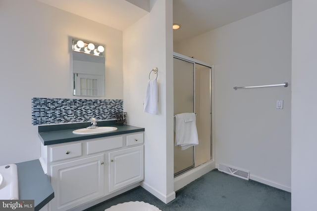 114 Moore Ln, Gap, PA 17527 - bathroom with decorative backsplash, a stall shower, baseboards, and vanity