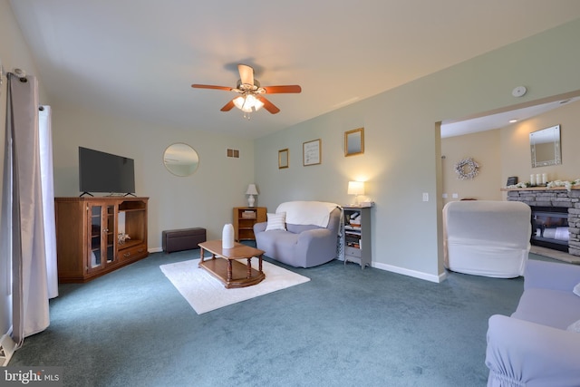 114 Moore Ln, Gap, PA 17527 - living area featuring a ceiling fan, carpet flooring, baseboards, and a stone fireplace